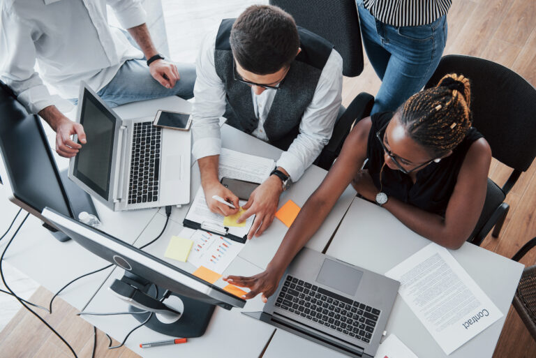 a group of multinational busy people working in the office.